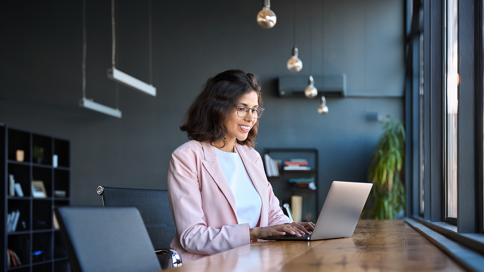 Happy,Latin,Hispanic,Young,Business,Woman,Working,On,Laptop,Computer