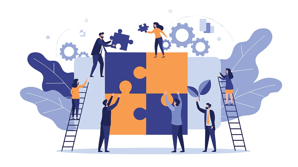 Wiedza o procesach rozproszona w dokumentach Zespół wspólnie układa duże puzzle, symbol łączenia wiedzy o procesach w jeden model